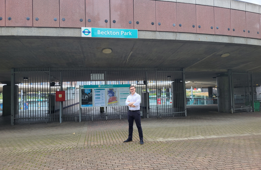 Freddie Downing standing outside Beckton Park DLR station